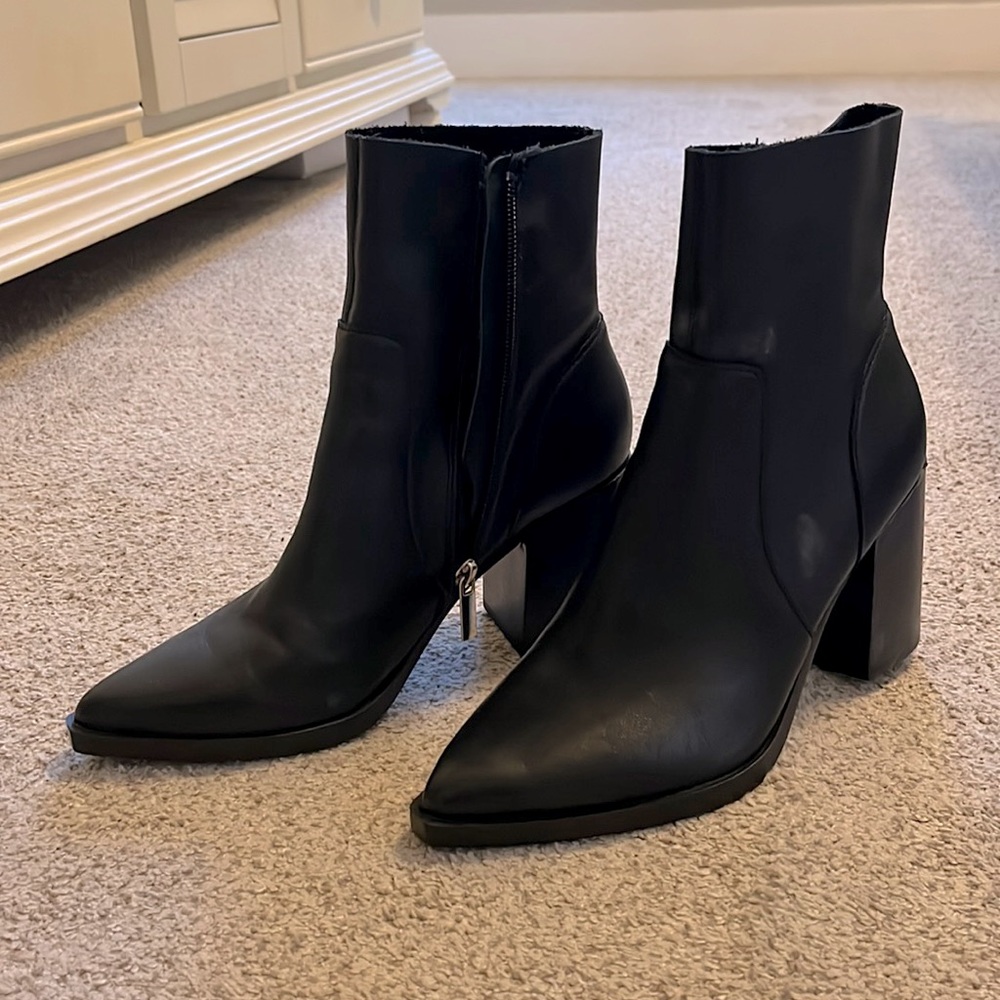 Steve Madden black booties.